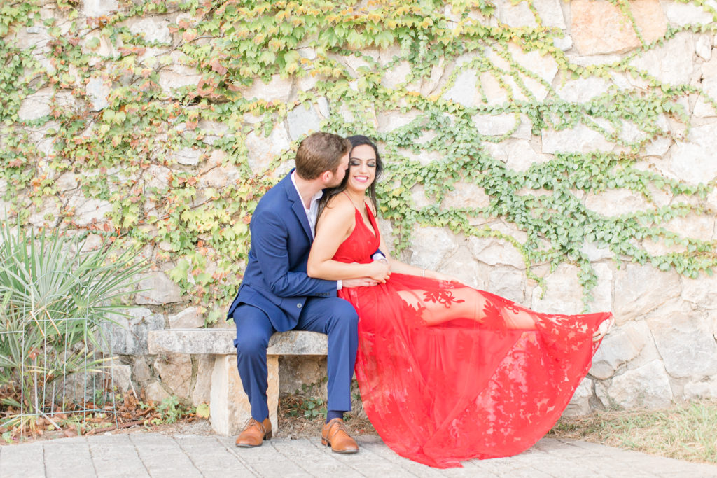 red dress engagement session at adriatica village