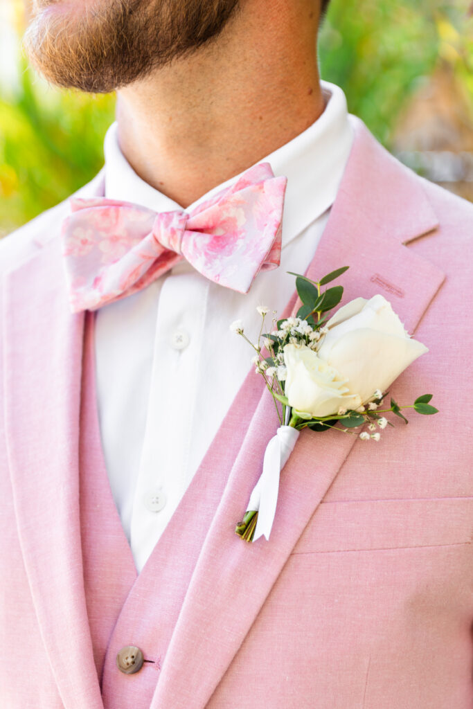 groom pink suit